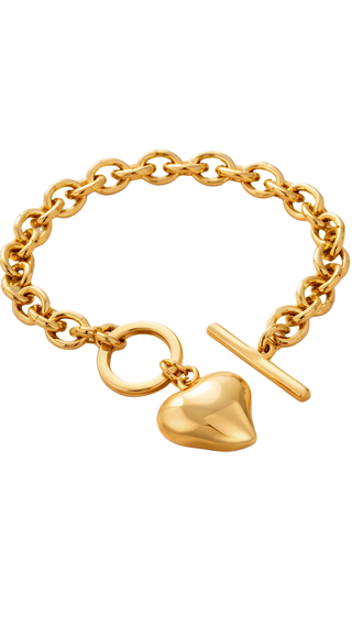 Gold chain bracelet with heart and toggle clasp charm on a white background