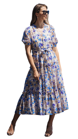 Woman wearing a floral dress on a white background