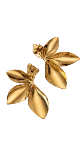 Pair of gold leaf-shaped earrings on a white background