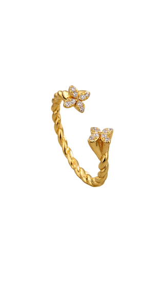 Gold open ring with butterfly designs on a white background